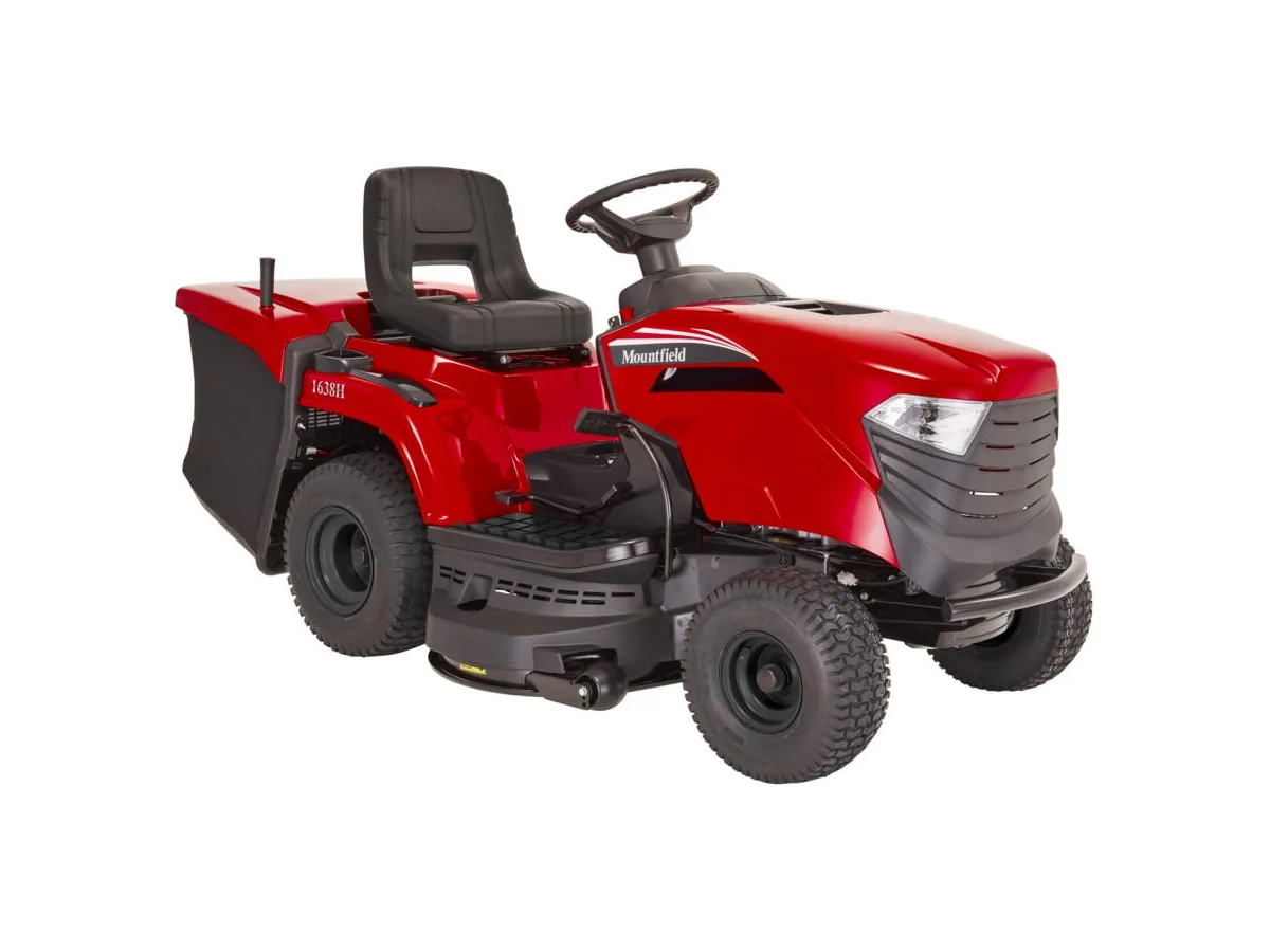 Mower being loaded with ramps